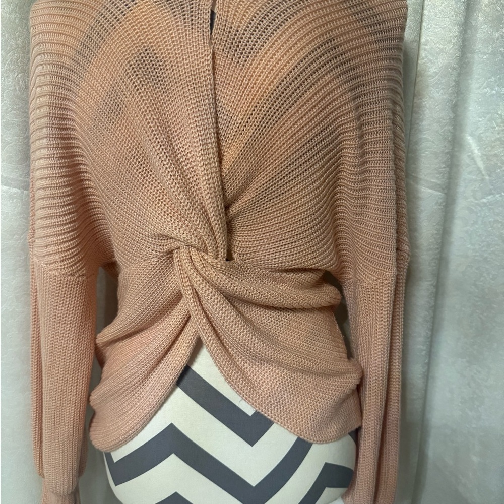 Soho New York & Company Jeans long sleeve sweater with a knot back.
